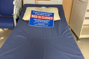 Coffs bed closed sign 300x200 1